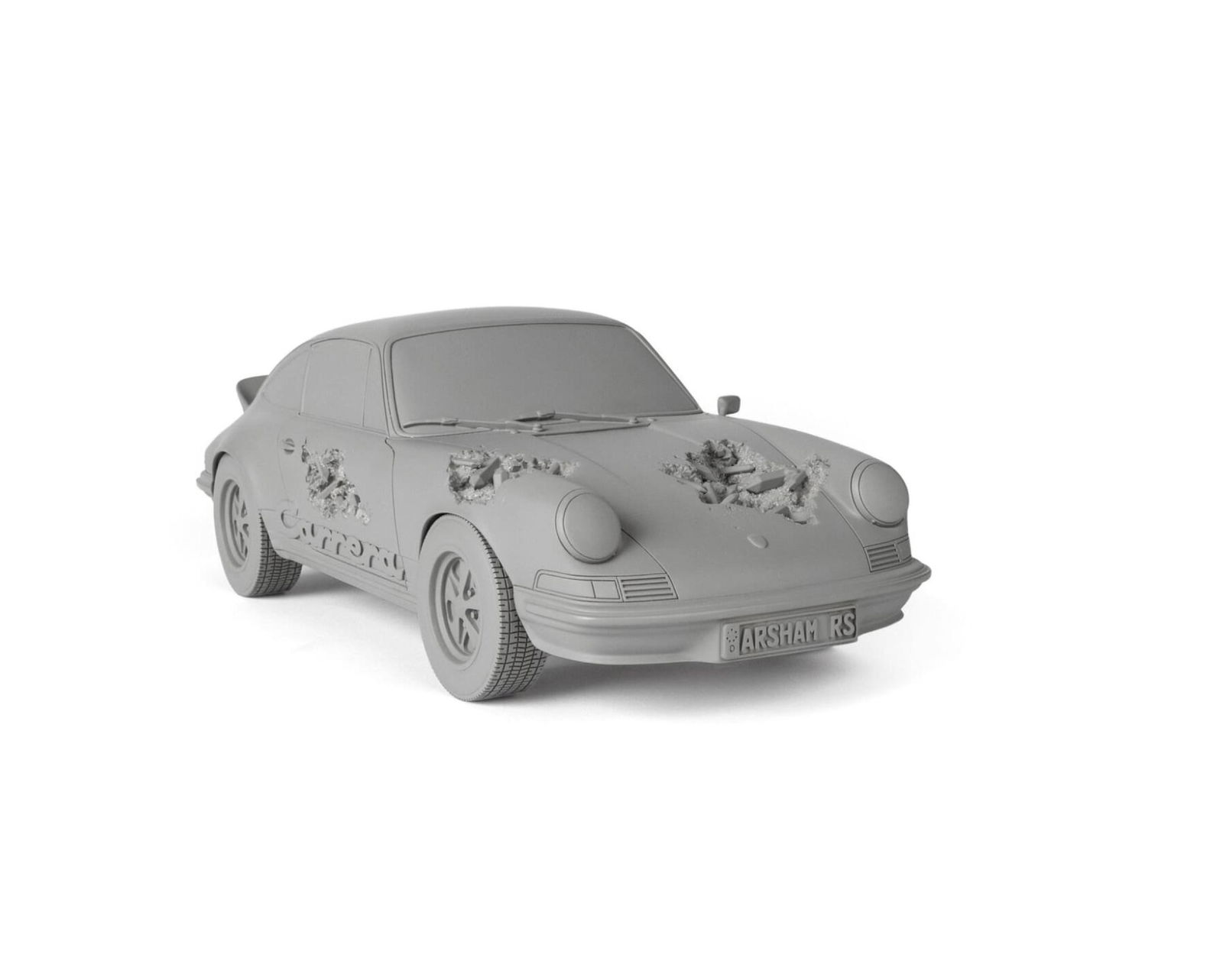 Daniel Arsham - ERODED PORSCHE CARRERA RS (GRAY): 2021. Resin, Plaster and Aluminium Oxide. Arsham studio. Limited edition of 500 . 30.1 × 12.4 × 10 cm / 13 x 6 x 3.3 in
