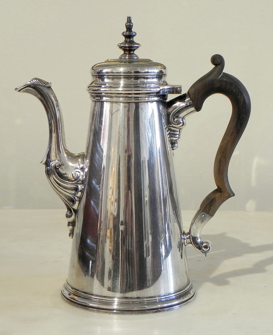Sterling coffeepot by Tiffany & Co.: Sterling coffeepot by Tiffany & Co., 34.45 troy oz with handle, 10"H.