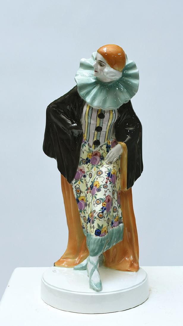 Large Goldscheider Art Deco figure of Harlequin: Large Goldscheider Art Deco figure of Harlequin titled “Le Palais Royal Habara”, woman in harlequin attire wearing black, orange, and turquoise cape, 17”H., signed made in Austria Go