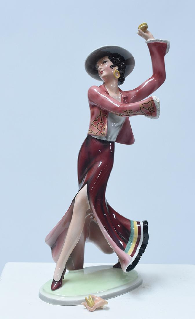 Goldscheider figure of Art Deco woman in flamenco: Goldscheider figure of Art Deco woman in flamenco attire, castanets in her hand. Marked Goldscheider Wien made in Austria, impressed 3452-3-30, ca.1925-30, 17.5”H.