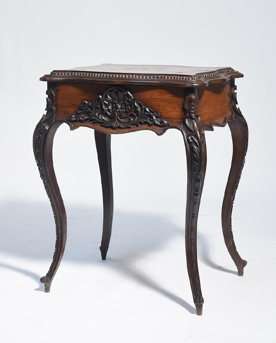 American rosewood Victorian sewing lift top cabinet: American rosewood Victorian sewing lift top cabinet, compartmentalized interior with mirror in lid, cabriole legs, carved case, 31”H. x 24”W.