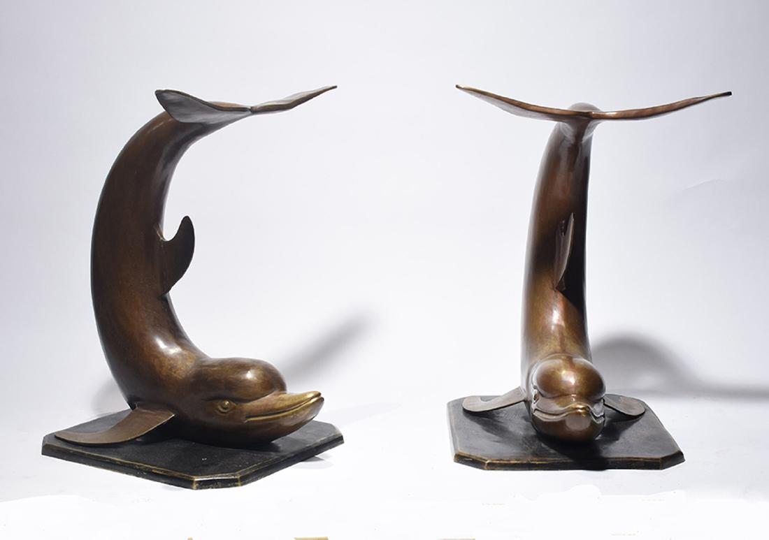 Pair of large size bronze dolphins, 20th C.: Pair of large size bronze dolphins, 20th C. nice detail, 29”H. x 21” across the tails x 21” deep
