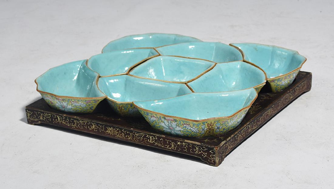 Nine pieces 19th C. Chinese enamel decorated ceramic: Nine pieces 19th C. Chinese enamel decorated ceramic food server with lacquer tray. Multi colored floral decoration on outside, aqua interiors, 14.5” square, 2.75”H. 