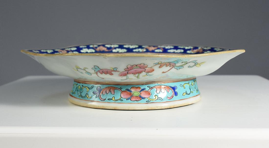 19th C. Chinese enamel decorated footed dish: 19th C. Chinese enamel decorated footed dish. Ducks, cranes, amid foliage. Very well painted 9”W. x 2.25”H., signed on bottom.