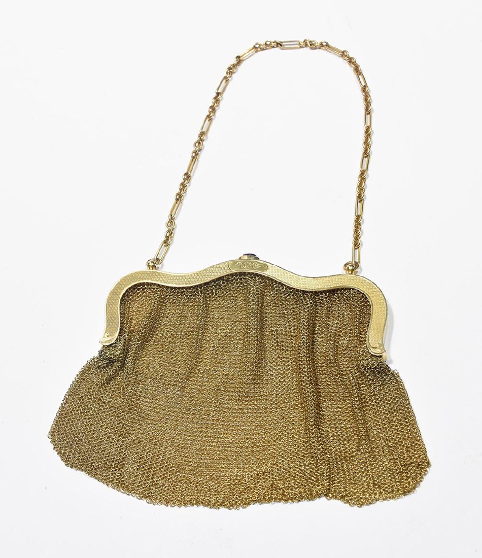 American 19th/20th C. 14K yellow gold mesh purse: American 19th/20th C. 14K yellow gold mesh purse. Bag 4”H. x 6”W., 9.25”H. overall, weighs 118.08 grams, ca.1900, stamped 14K. 