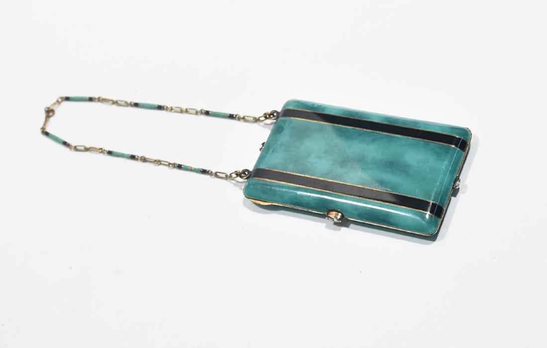 Art Deco 14K yellow gold and enamel minaudiere: Art Deco 14K yellow gold and enamel minaudiere, with diamond set thumb latches. Green and black enamel body and chain compact interior. Green enamel mottled to resemble malachite, ca.1925,