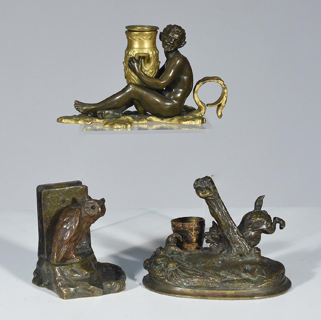 Three 19th C. bronze items: Three 19th C. bronze items. 1-bronze figural candle holder signed L. Kley; 1-bronze dog match holder; 1-bronze owl match holder, tallest 3.5”H. 