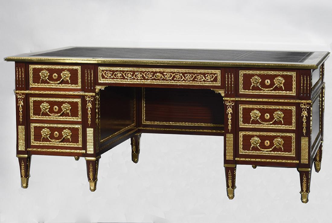 Empire style mahogany flat top desk: Empire style mahogany flat top desk. Bronze mounts with privacy skirt, 31”H. x 72”W. x 34.5”D.
