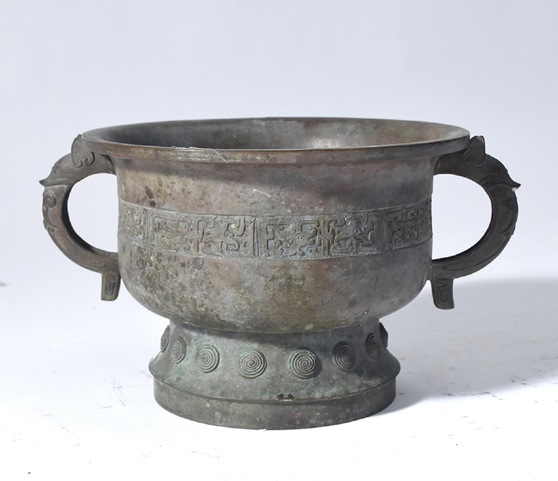 Asian bronze censer with animal motif handles: Asian bronze censer with animal motif handles, 7.5”H. x 10.5”Dia.