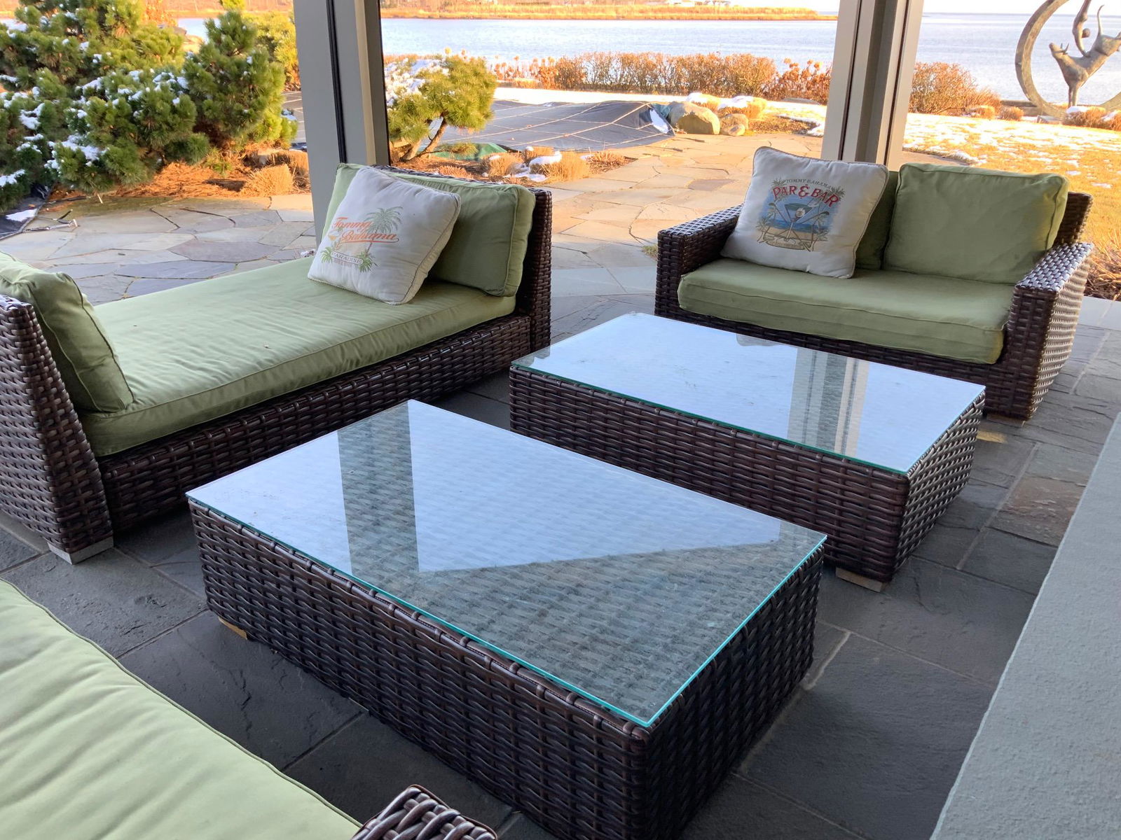 Restoration Hardware outdoor wicker style set: Five piece outdoor wicker style set by Restoration Hardware, green upholstered cushions. Daybed is 87"L. x 44"W. x 30"H., at the arms the two settees are 64"L. x 38"D. x 29"H. to the top of the back.