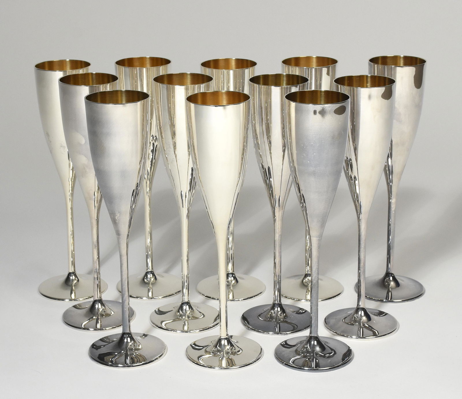 Set of 12 Buccellati sterling silver champagnes: Set of twelve Buccellati sterling silver champagnes marked on bottom Buccellati Italy, 9.25"H., approx. 73.5 T.oz.