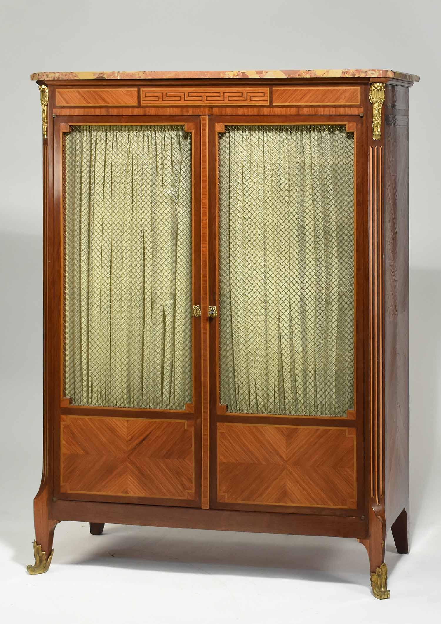 French Louis XV Style Bibliothèque: French Louis XV style inlaid and marble top bibliothèque, with bronze mounts. 44”W x 61.5”H x 18.5”D. Sotheby’s provenance.