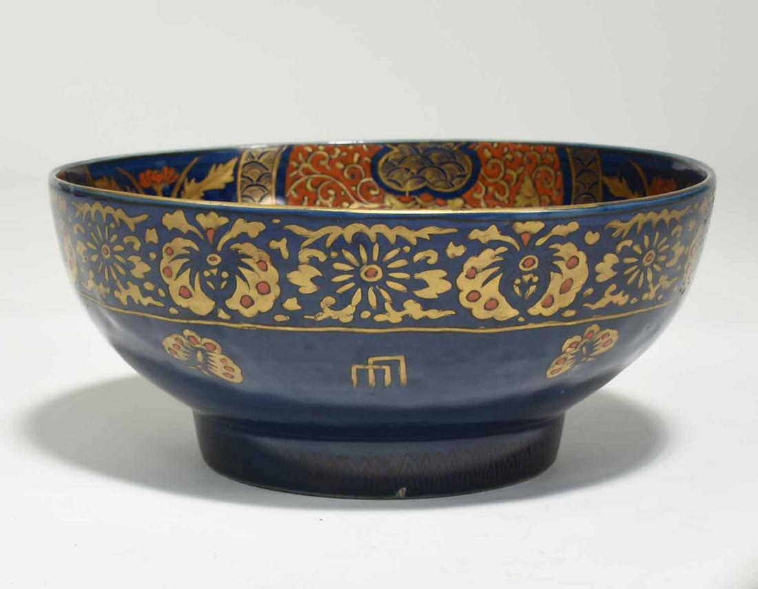 Chinese Imari Palette Porcelain Bowl: Chinese Imari palette porcelain bowl with floral and butterfly decoration, 12” dia. x 5.5”H. 5.5 lbs.