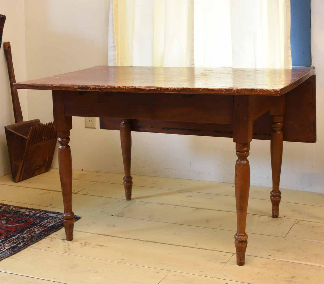 19th C. Single Drop-Leaf Work Table: 19th C. turned leg single drop leaf work table, in birch and pine, 28"H. x 42"L. X 27”W with leaf down, 39.5”W with leaf up.