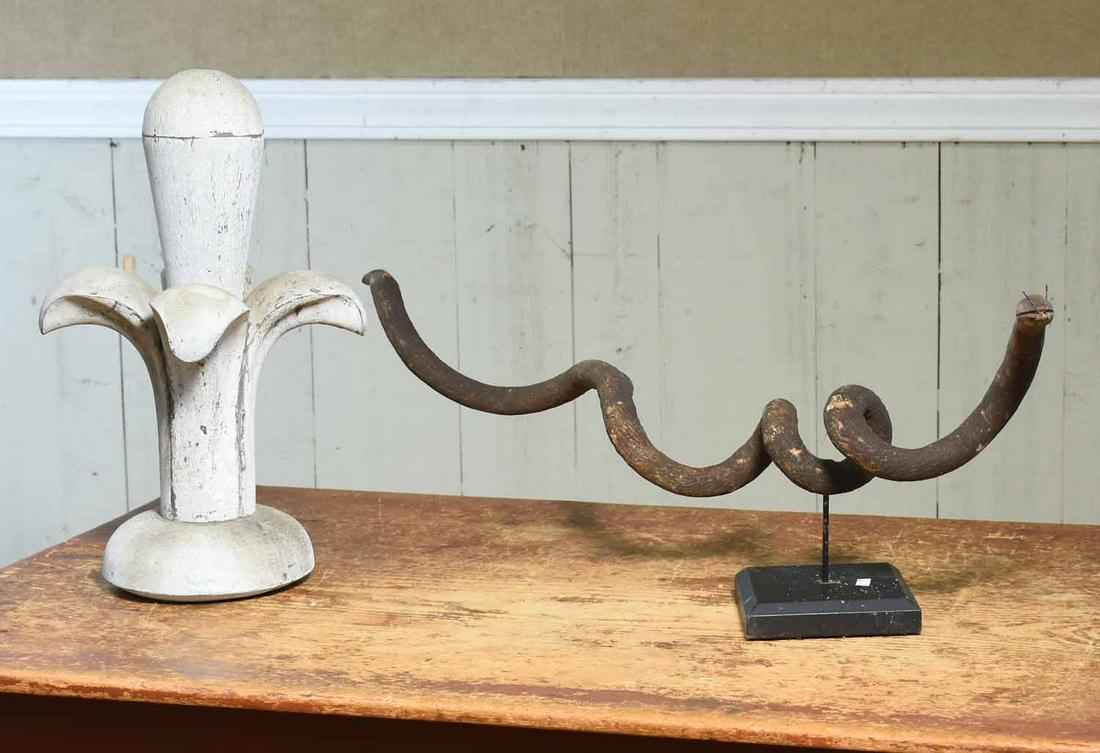 Zinc Finial and Wooden Snake: Architectural zinc finial 18"H. with a folk art carved rattle snake, 36"L.