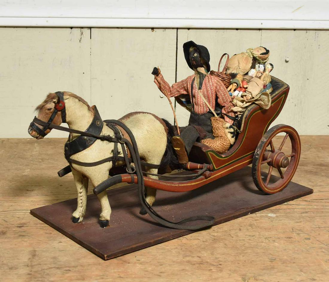 19th C. Country Toy Horse Drawn Cart: Country 19th C. horse drawn cart with seven small dolls, 17"L. x 7”W at base, 8”H.