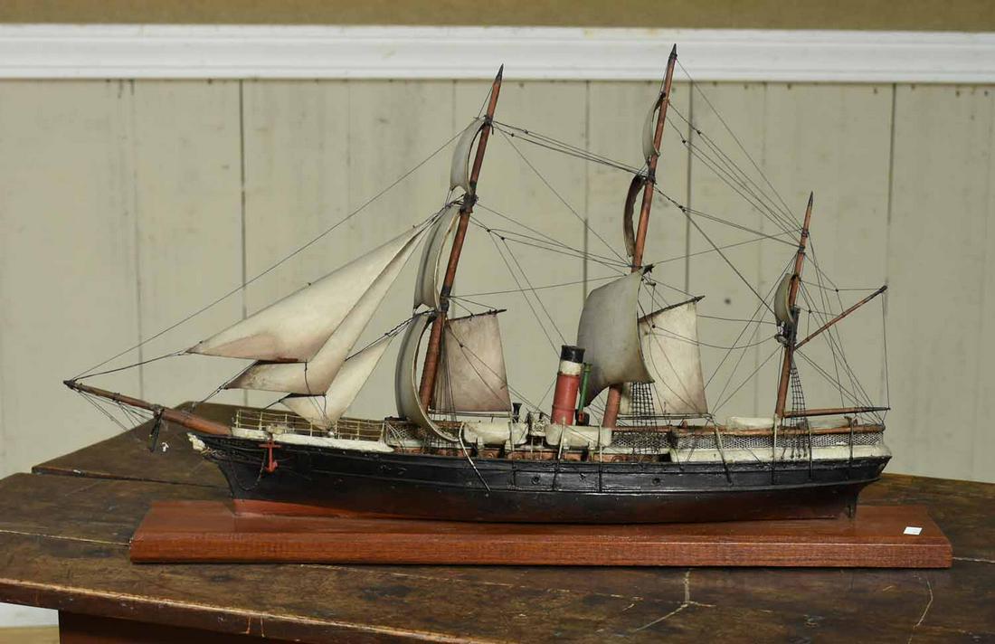 Primitive Wooden Ship Model: Primitive 19th C. wooden ship model with wooden sails, 27"L. x 14"H.