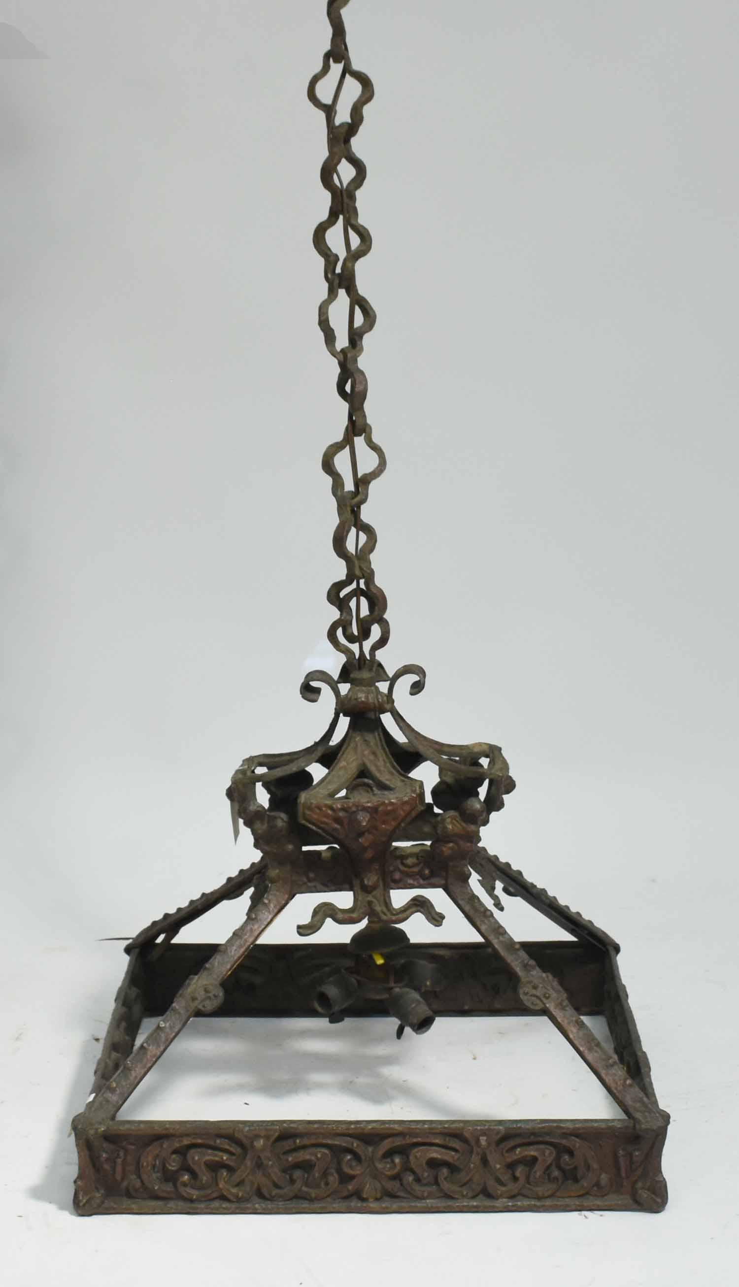 Arts & Crafts Bronze Lamp Figure: Arts and Crafts bronze lamp fixture, hammered Medieval design, without slag panels. 25.75”H x 26”L x 26”W.