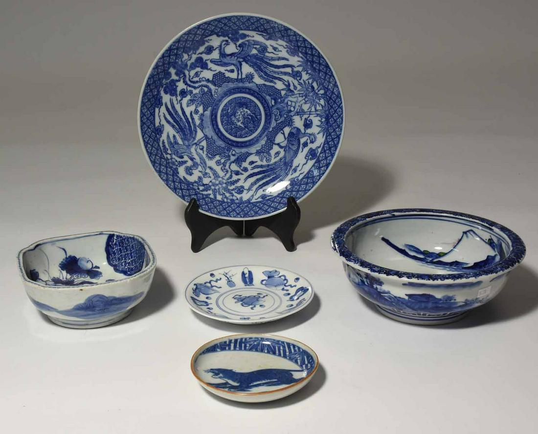 Japanese Blue and White Porcelain: Five pieces of Japanese blue and white porcelain, including bowls and chargers, 11.25" dia charger