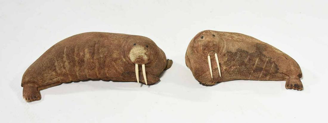 Two Inuit Whale Bone Carvings, Walruses: Two Inuit whale bone carving, walruses, larger example 11.5”L, smaller example 8.5”L. 