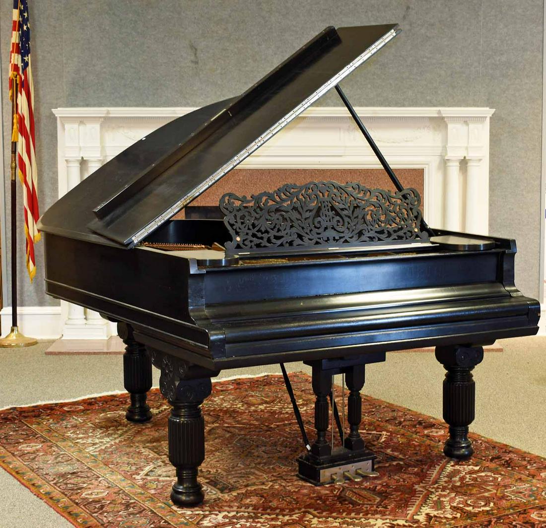 Steinway and Sons Baby Grand Piano: Steinway & Sons baby grand piano in black paint, carved legs, 22/12.96, 2869. 56"W x 72"L x 37"H. ca.1900.