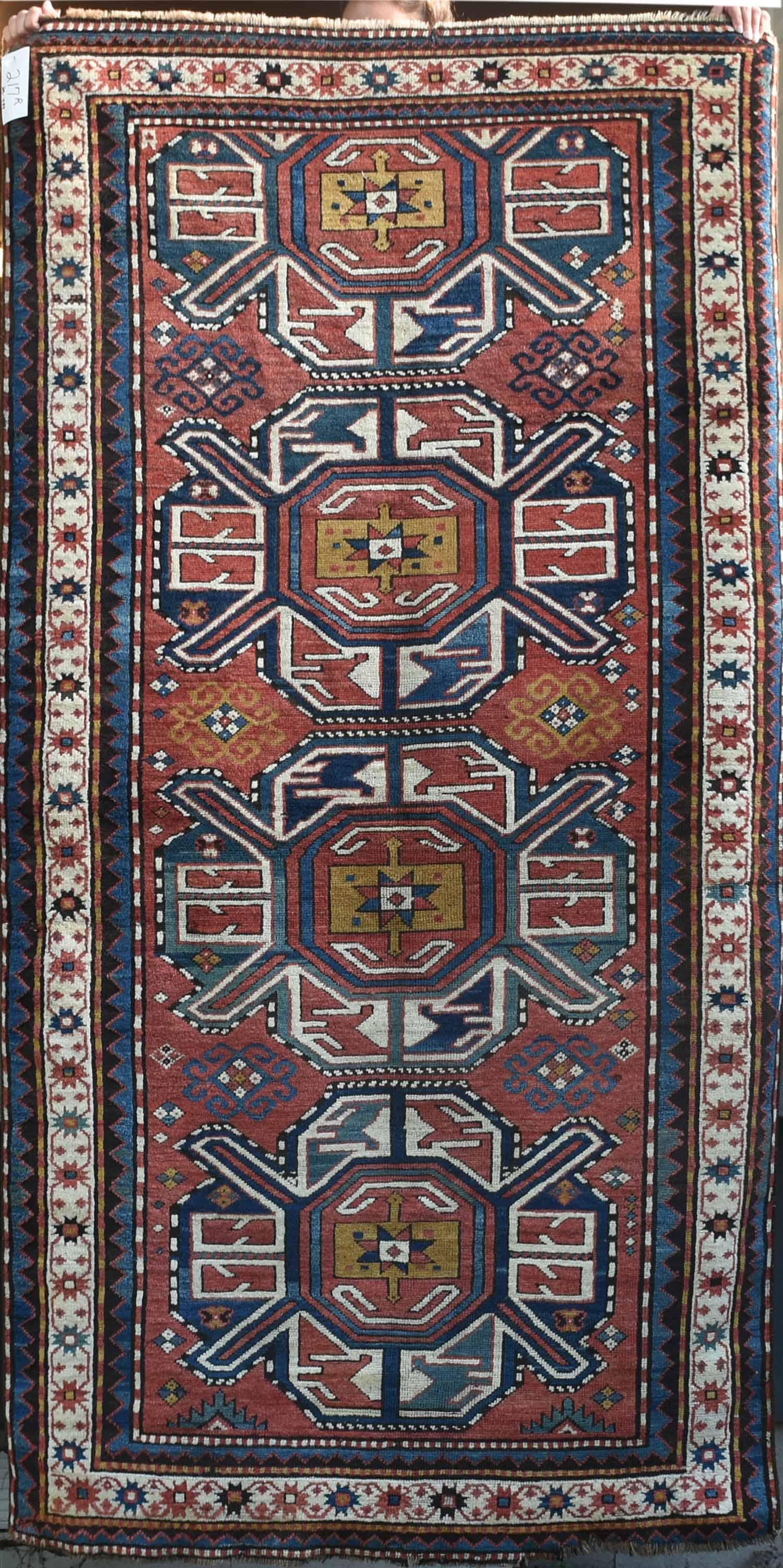Antique oriental scatter rug: Antique Oriental scatter rug with bright orange navy and ivory patterns. 4’3” x 8’7”