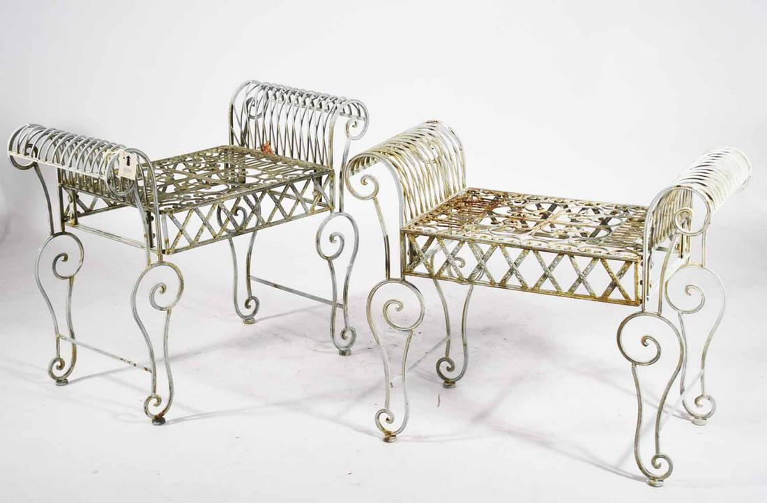 Pair of decorative iron garden benches/settees: Pair of decorative iron garden benches/settees with rolled arms, 33.5” W X 27” H X 16” D