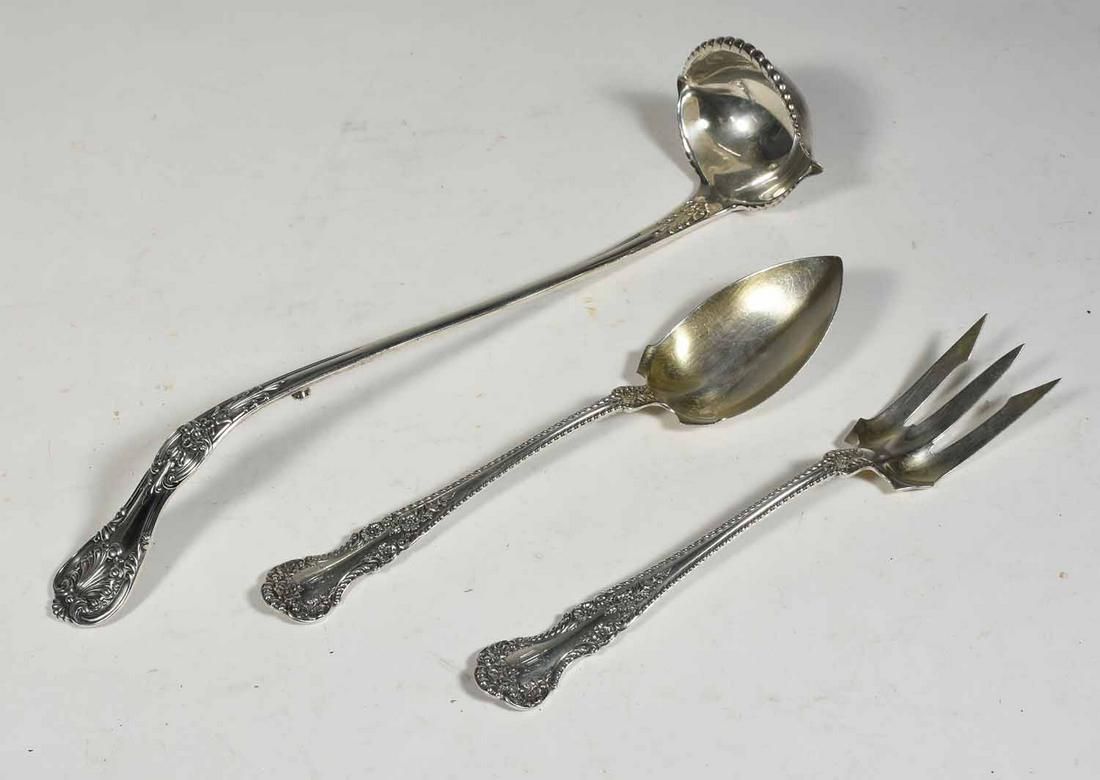 Gorham sterling salad fork/spoon w/ a Tiffany ladle: Gorham sterling salad fork/spoon with a Tiffany ladle, the ladle 15"L signed Tiffany and Co, the spoon and fork 10" L, 14 t oz