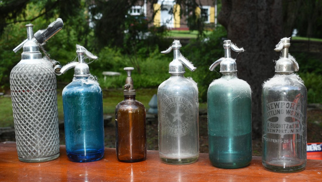 Group of vintage atomizer bottles: Group of vintage atomizer bottles, including some with color, heights 9"-14" , six pieces. incl. Newport NH example.