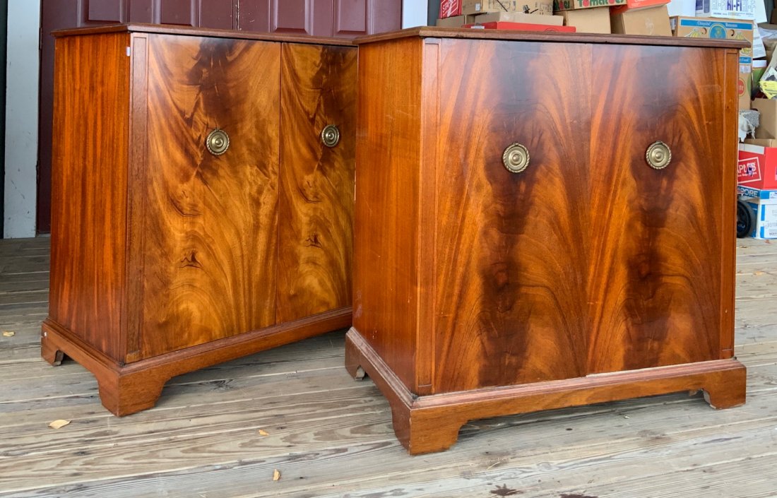 Pr of 1940s mahogany cabinets: Pair of 1940s mahogany cabinets, low profile 2 door cabinets with nice crotch mahogany door fronts, on bracket base, 36"H x 34"W x 19"D, one cabinet contains stereo equipment and holes in back for cor