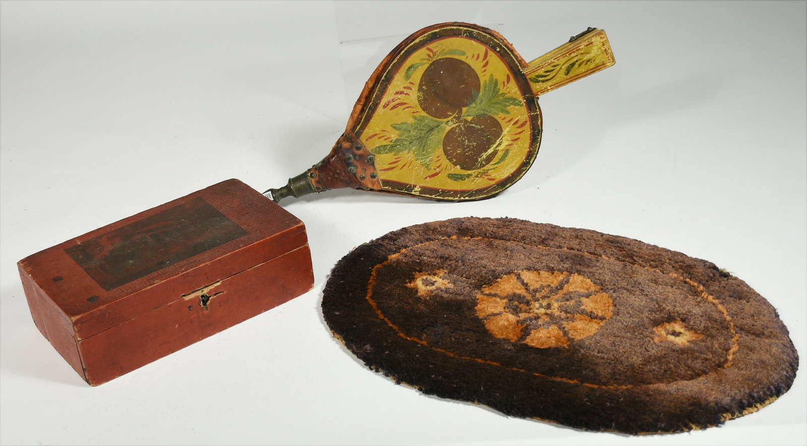 Country lot: Country lot: decorated box with transferred scene of building, bellows in mustard paint and an oval sheared rugBox: 9.5” L Bellows: 18” L Rug: 18”L 