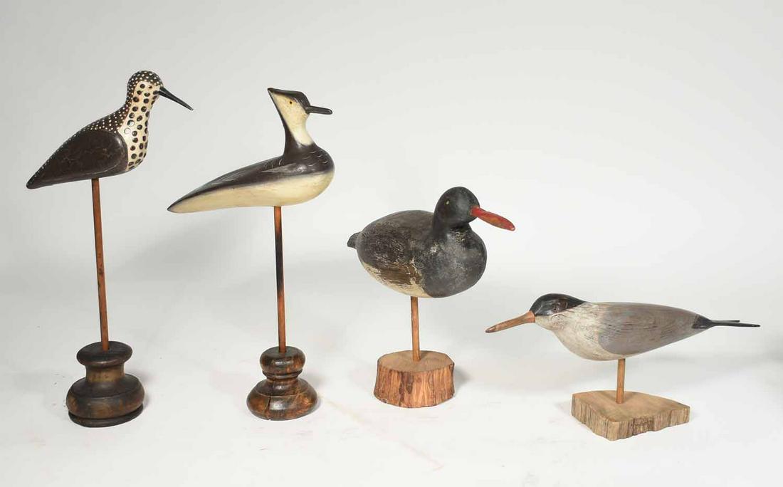 4 carved decoys & shore birds: 4 carved decoys and shore birds on stands, 11"-17"L. range.