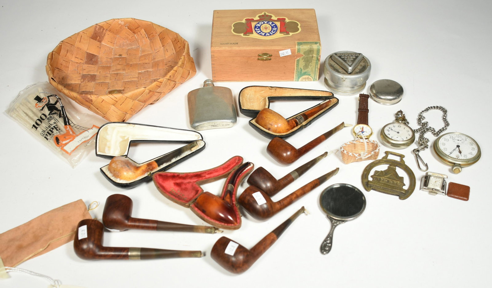 Assorted group of pipes: Assorted group of pipes including meerschaum, wood some with names along with woven birch bark basket, cigar box, watches including Waltham and other