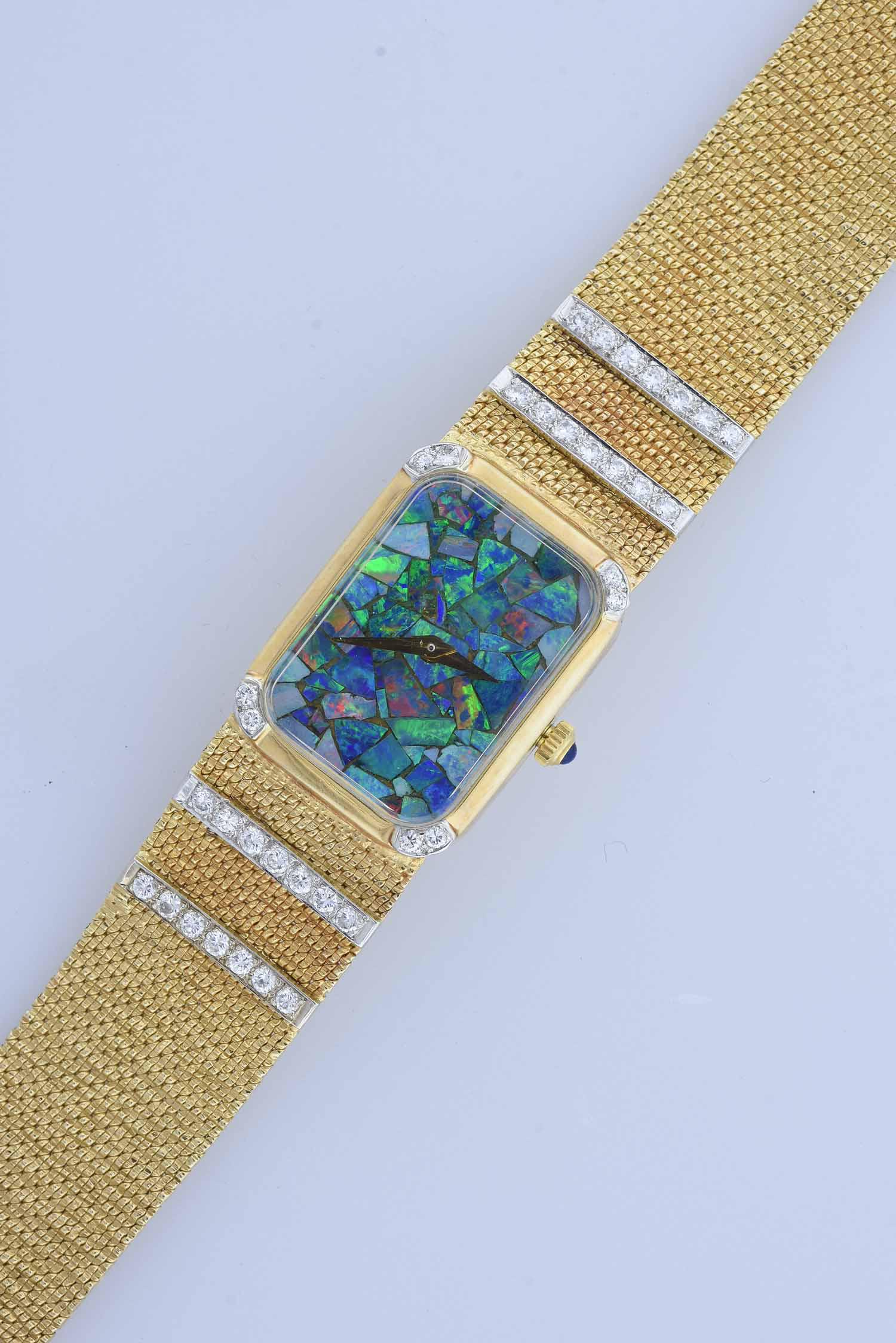 14k yellow gold and diamond ladies wrist watch: 14k yellow gold and diamond ladies wrist watch, rectangular shaped dial with opal stones, mesh style band set with diamonds approx. 7'L, 39 grams