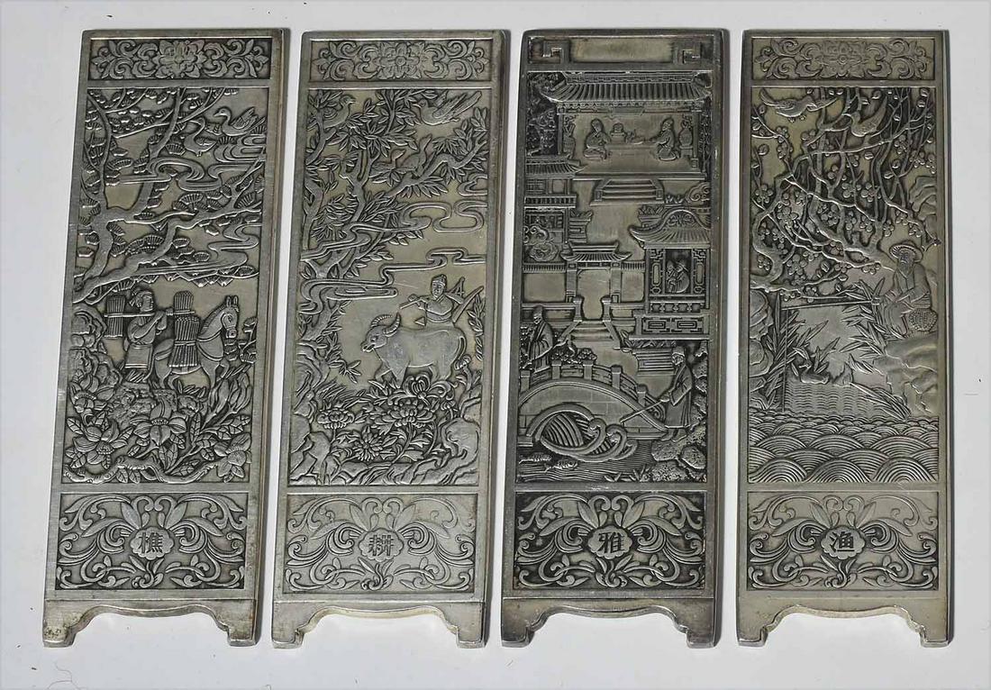 Set of 4 Chinese silver scroll weights: Set of 4 Chinese silver scroll weights, depicting a 4 panel screen with Asian scenes signed on reverse, 6"H x 1.75"W, 24.95 T. Oz.