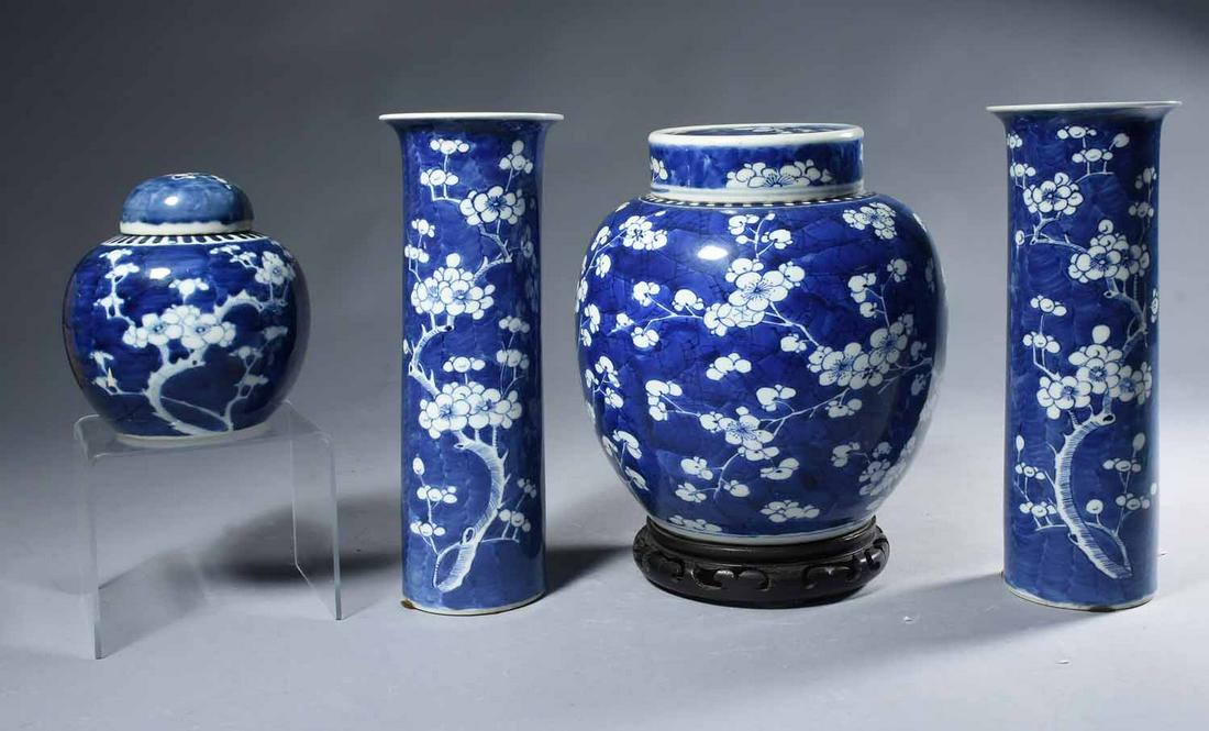 Antique Chinese Porcelain W/ B & W Prunus Decoration: Pair of 11.75 H cylindrical Chinese porcelain vases with double concentric ring mark on base, along with two similar covered porcelain ginger jars, 10Â” & 6Â” H - all four pieces with blue and w