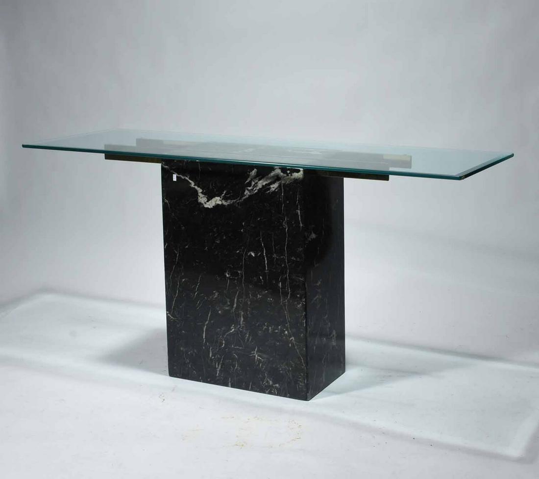 Artedi (Italian) black marble console table, circa 1970: Artedi (Italian) black marble console table, circa 1970. With clear glass top and plated metal supports, height 28 3/4" x length 59" x depth 19"