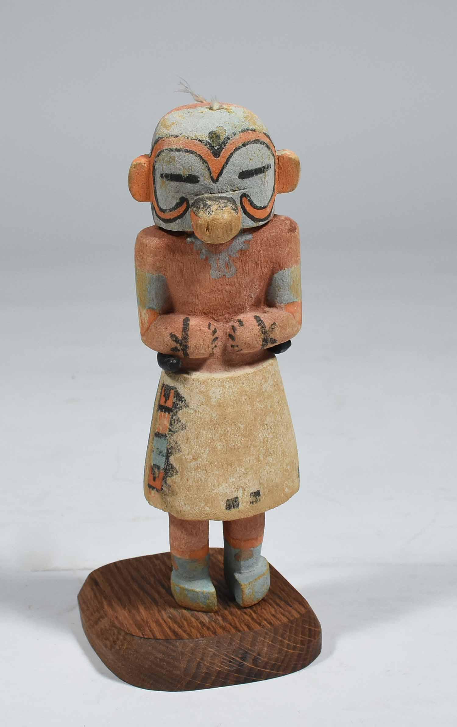 CA. 1900 HOPI COTTONWOOD KACHINA DOLL: With old multi-color pigment paint on stand, 7" H x 2 1/2" W. 