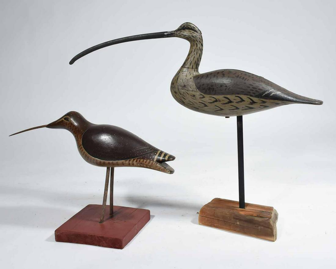 TWO 20TH C. CARVED AND PAINT-DECORATED LONG-BILLED: The first early-mid 20th c. hollow-bodied with detachable bill doweled through the head 26 1/2” H x W x L; the second by an unknown South N.J. carver circa 1980s with iron bill 15” H x 6&#