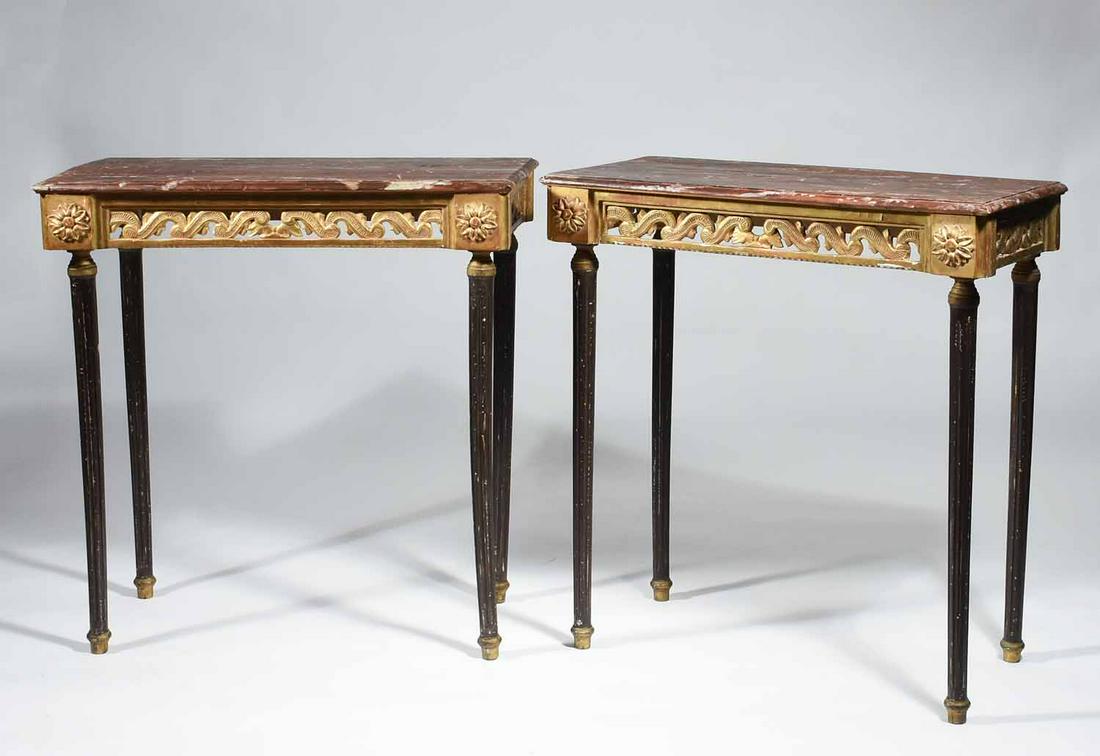 ANTIQUE CONTINENTAL NEO-CLASSICAL CONSOLE TABLES: Carved, gilt and paint decorated tables on straight fluted legs. Tops with faux marble paint decoration, relief through carved gilt frieze. 34.5" H X 31" W X 14.75" D