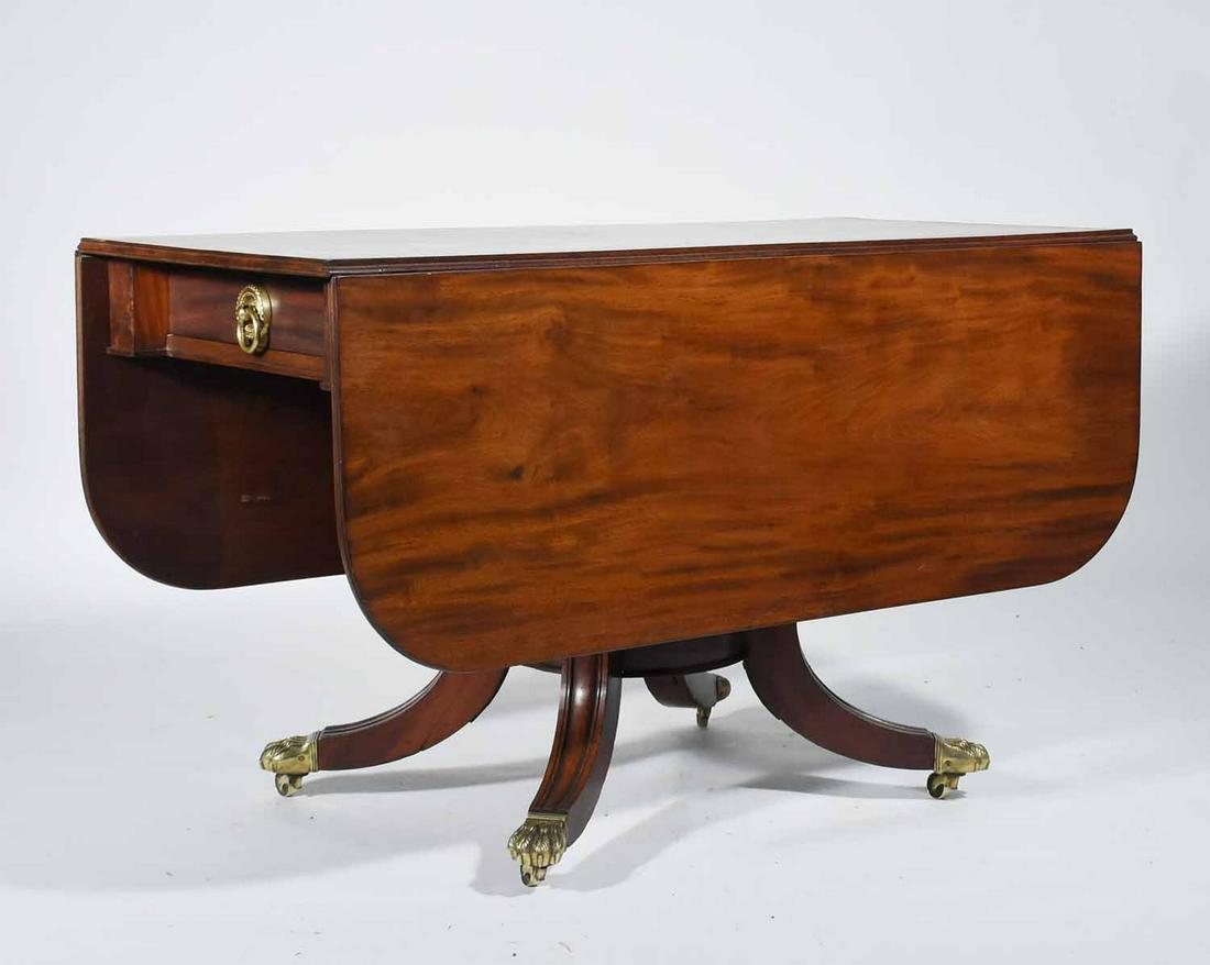 19TH C. NY AREA CLASSICAL DUNCAN PHYFE SCHOOL TABLE: 19TH C. NY AREA CLASSICAL DUNCAN PHYFE SCHOOL TABLE. Table constructed from heavy solid mahogany with two working drawers on pedestal base and lions paw brass caster feet. Provenance in drawer states