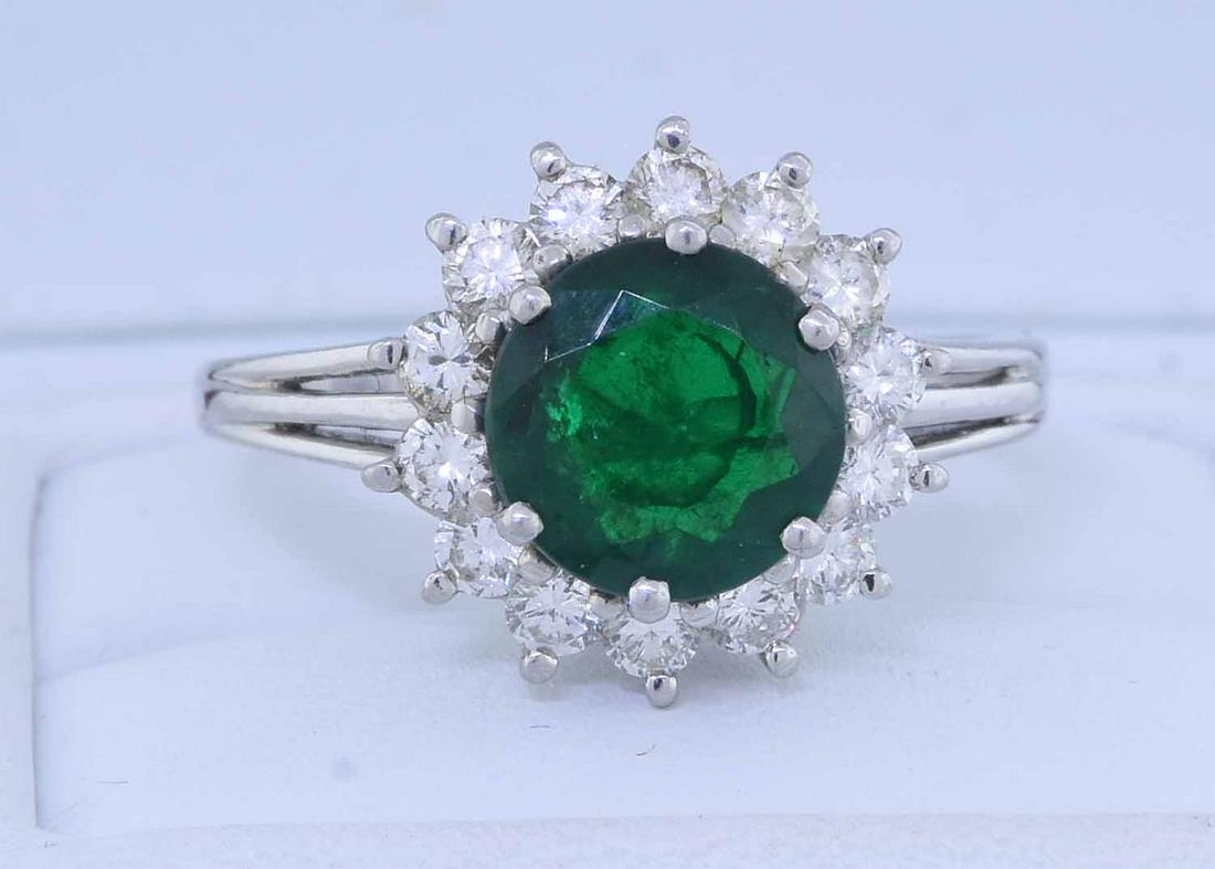 EMERALD & DIAMOND PLATINUM HALO RING. (1 of 5)
