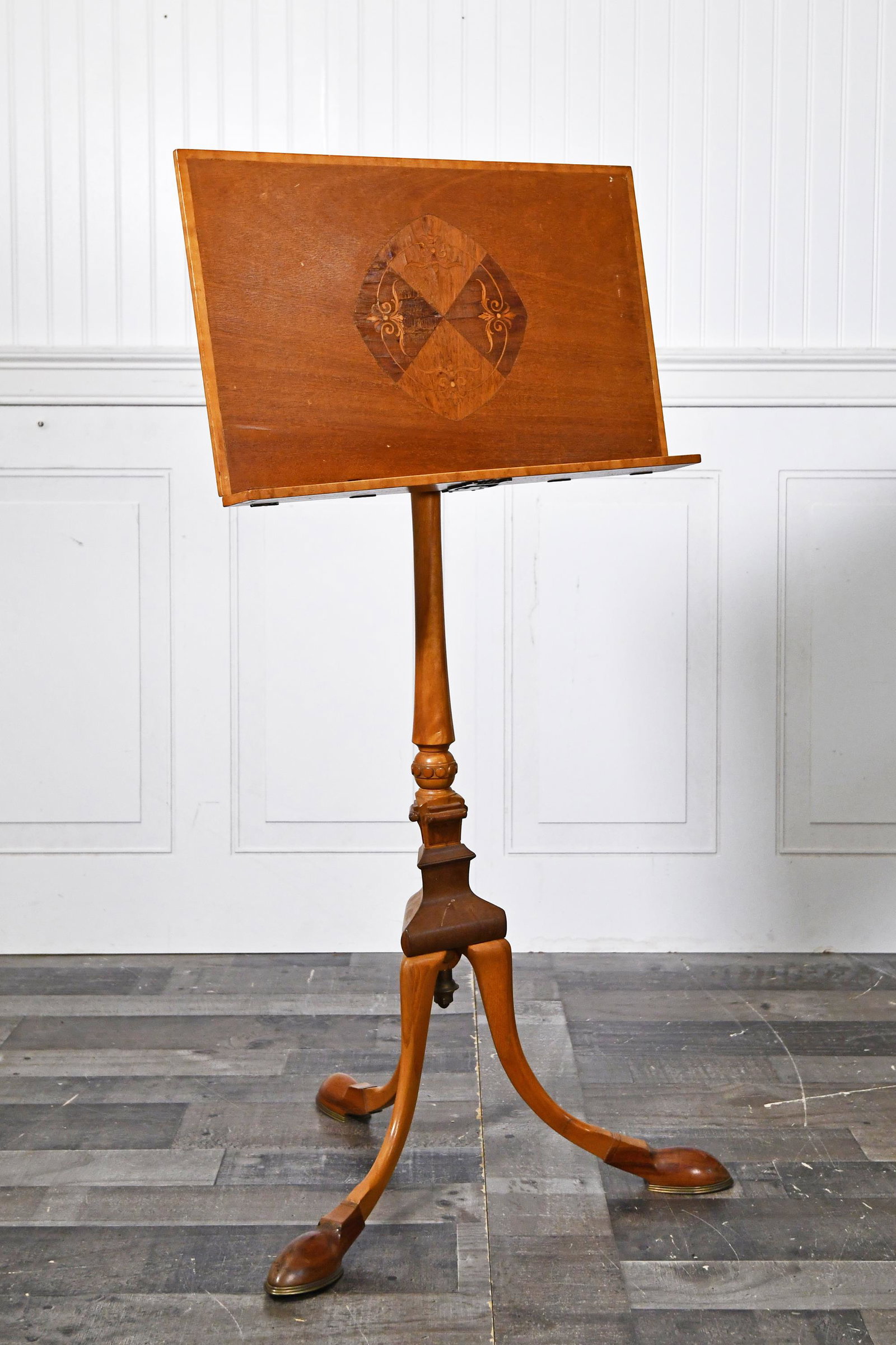 FINE ANTIQUE MAHOGANY MUSIC STAND: Inlaid and fitted with custom brass hinges and pad feet. Adjustable height and swiveling top. 40”H (down) x 19”W