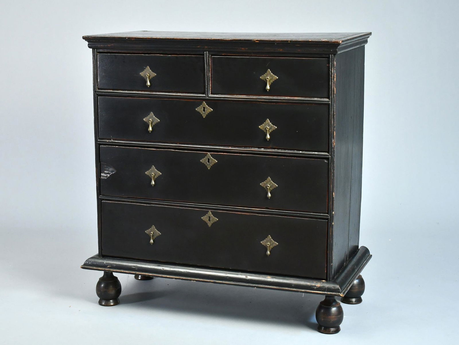 18TH C. WM. AND MARY BLACK PAINTED BALL FOOT CHEST. (1 of 9)
