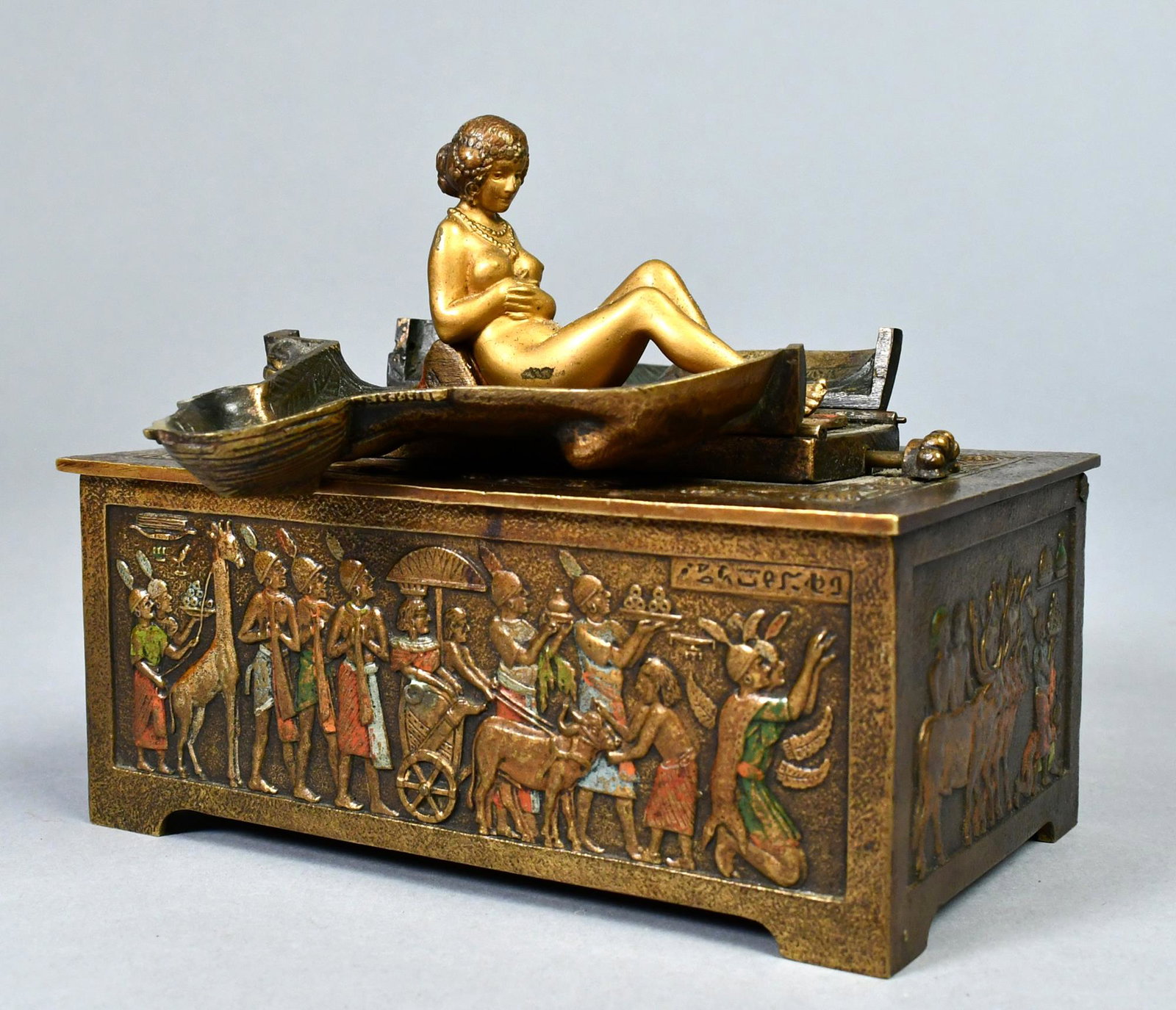 BERGMANN BRONZE MECHANICAL EROTICA.: A mechanical Franze Bergmann monogramed signature bronze hinged dresser box with a wood interior, with a dore bronze and cold painted surface. With the push of a button the sphinx opens to reveal a re