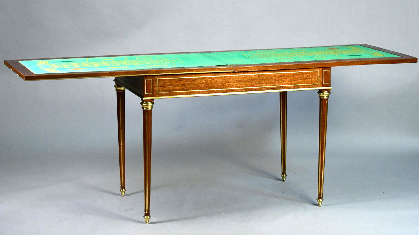 A FINE LOUIS XVI STYLE BRASS INLAID GAMES TABLE. (1 of 7)