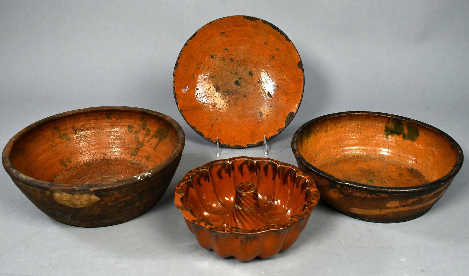FOUR LARGE 19TH C. REDWARE PIECES. (1 of 6)