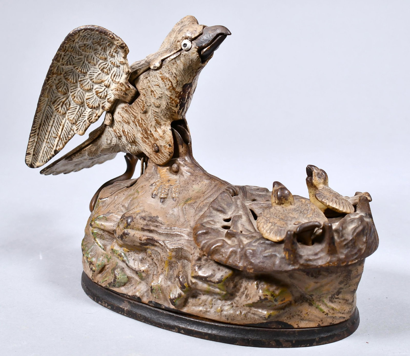 EAGLE AND EAGLETS MECHANICAL BANK. (1 of 6)