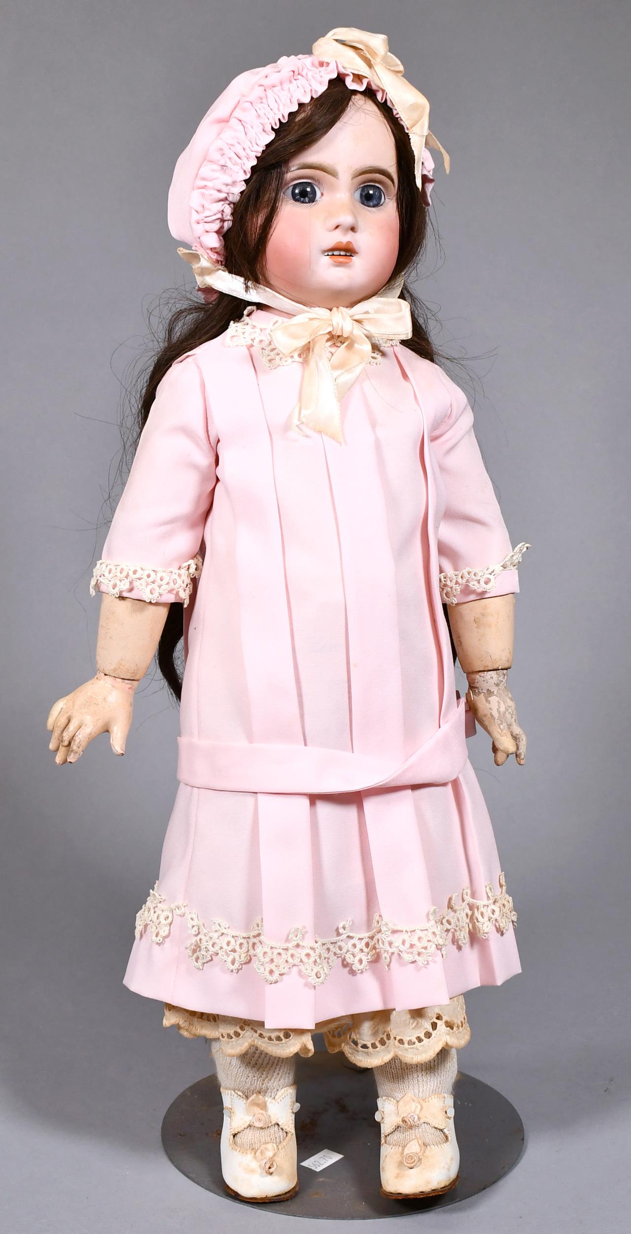 RARE JUMEAU BISQUE DOLL MARKED WITH AN “X”.: Very nice face with open mouth, exposed teeth, and very well done deep eyes. Doll has human hair wig, pink dress with matching bonnet, with vintage slip and footwear. Has an “X” on back of