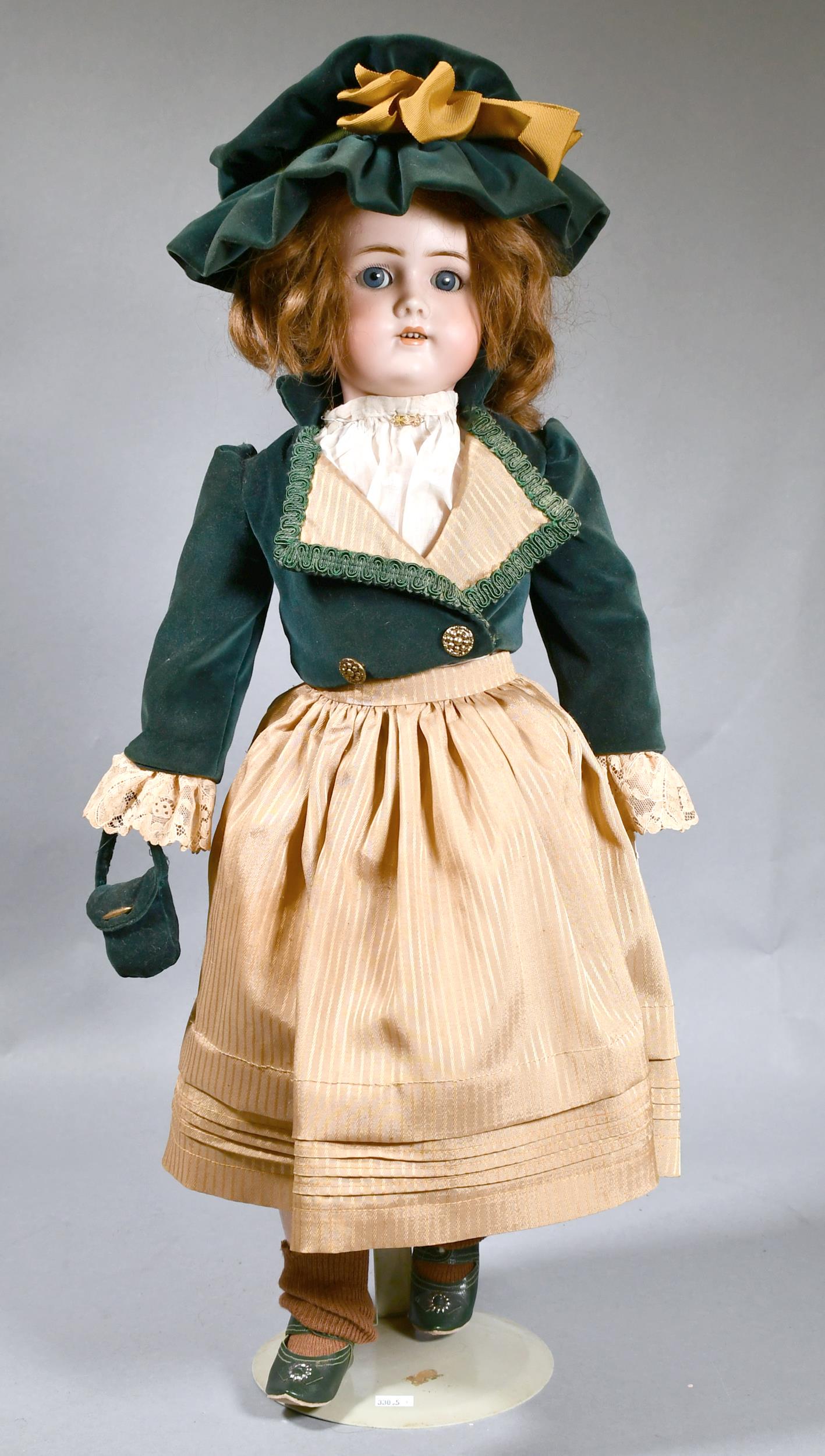 CM BERGMANN SIMON AND HALBIG BISQUE DOLL WITH STAND. (1 of 5)